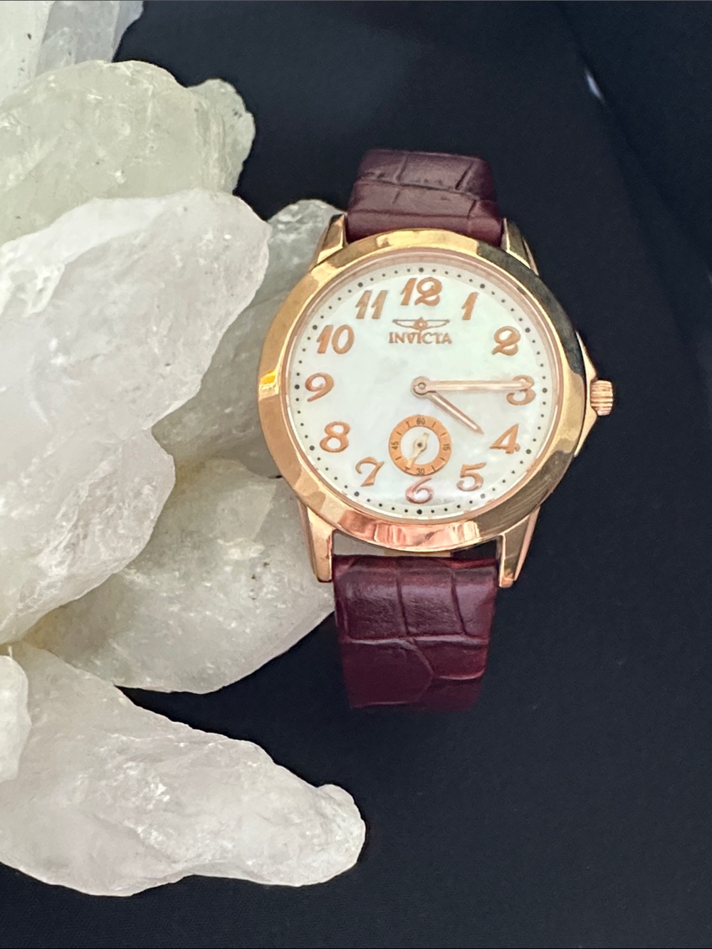 Invicta EUC genuine mother of pearl & rose goldtone watch. Genuine leather band